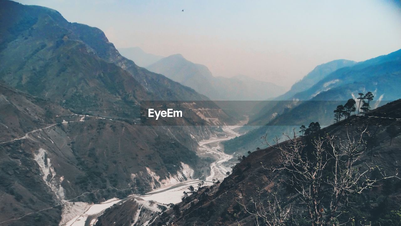 Scenic view of mountains against sky