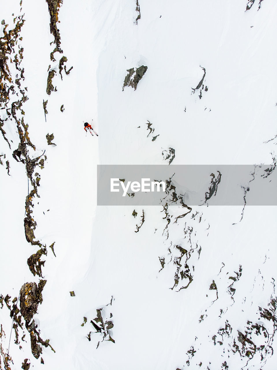 High angle view of skier on snow covered mountain