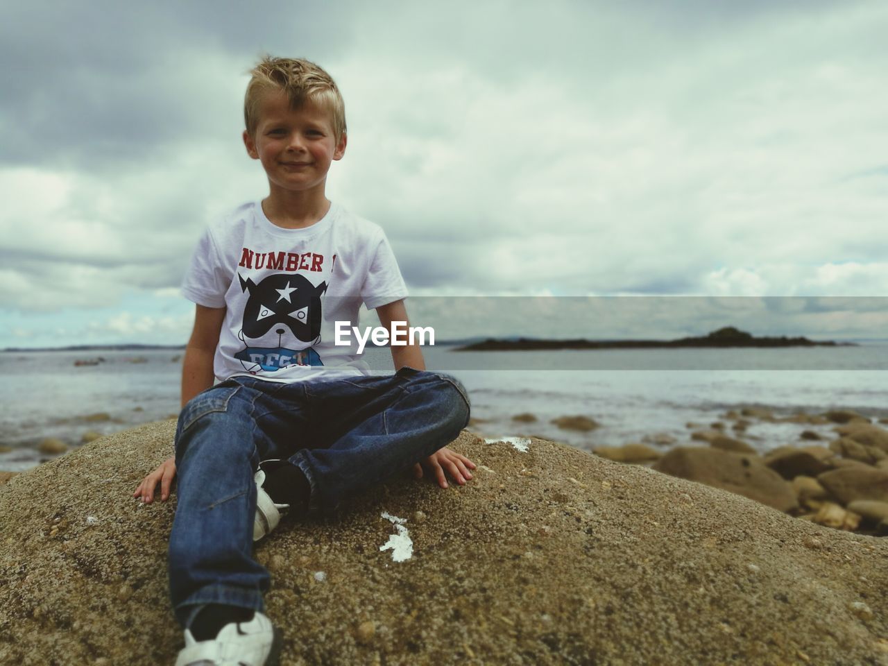 FULL LENGTH OF A BOY ON BEACH