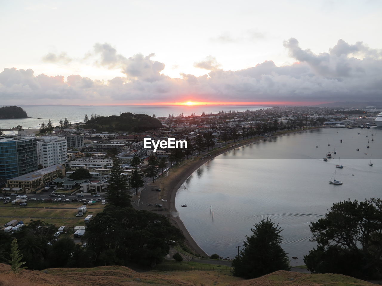 VIEW OF CITY AT SUNSET
