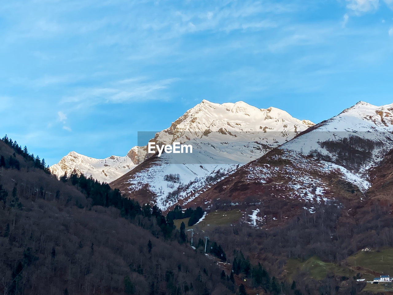 mountain, scenics - nature, snow, sky, environment, mountain range, landscape, beauty in nature, cold temperature, winter, nature, snowcapped mountain, cloud, travel destinations, tree, land, no people, plant, travel, tranquil scene, tranquility, tourism, mountain peak, pinaceae, pine tree, ridge, coniferous tree, non-urban scene, outdoors, wilderness, blue, forest, mountain pass, pine woodland, day, plateau, valley, idyllic, rock