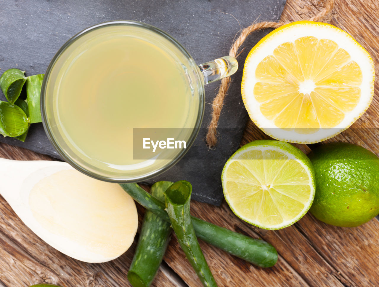 Drink aloe vera and lemon. glass cups on a slate tray.