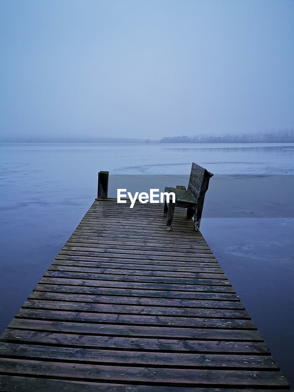 Dock in a frozen lake