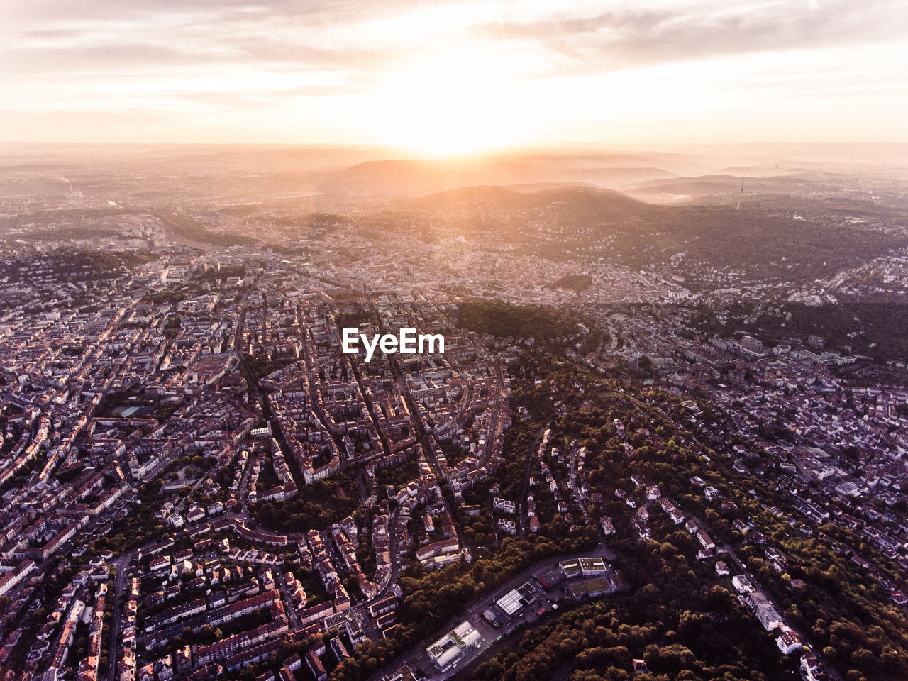 Aerial view of cityscape during sunset