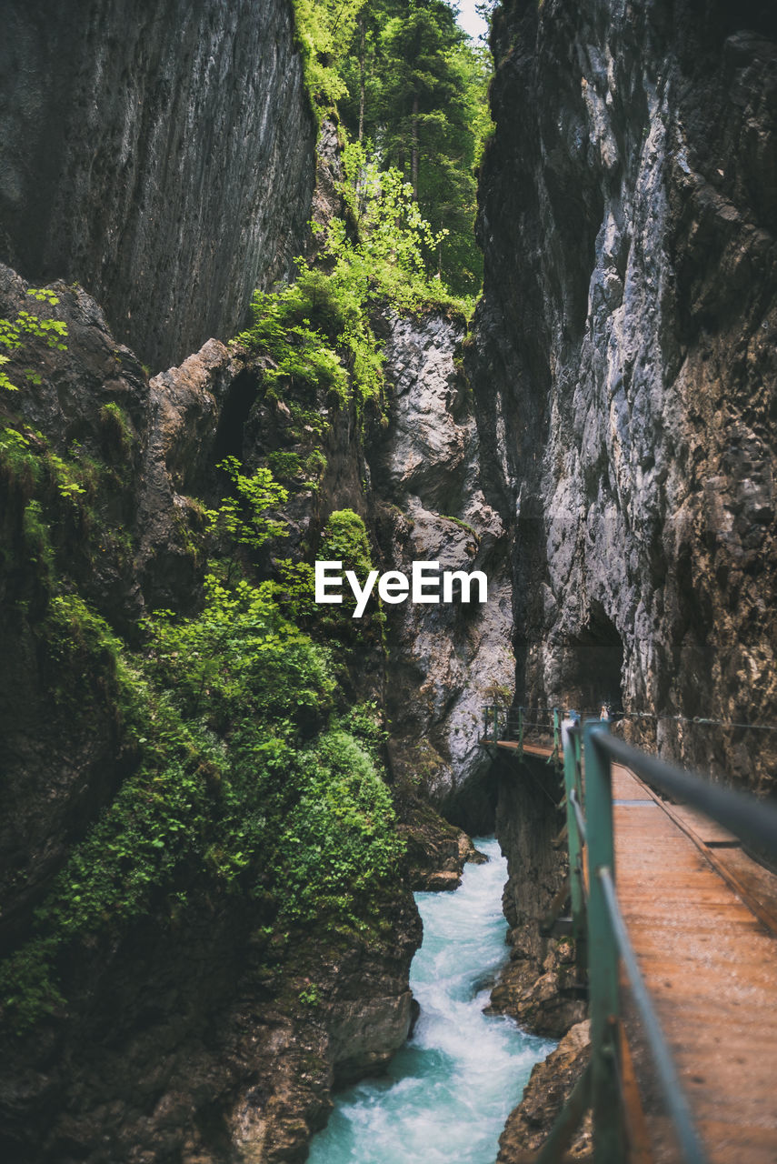 high angle view of river amidst rocky mountains