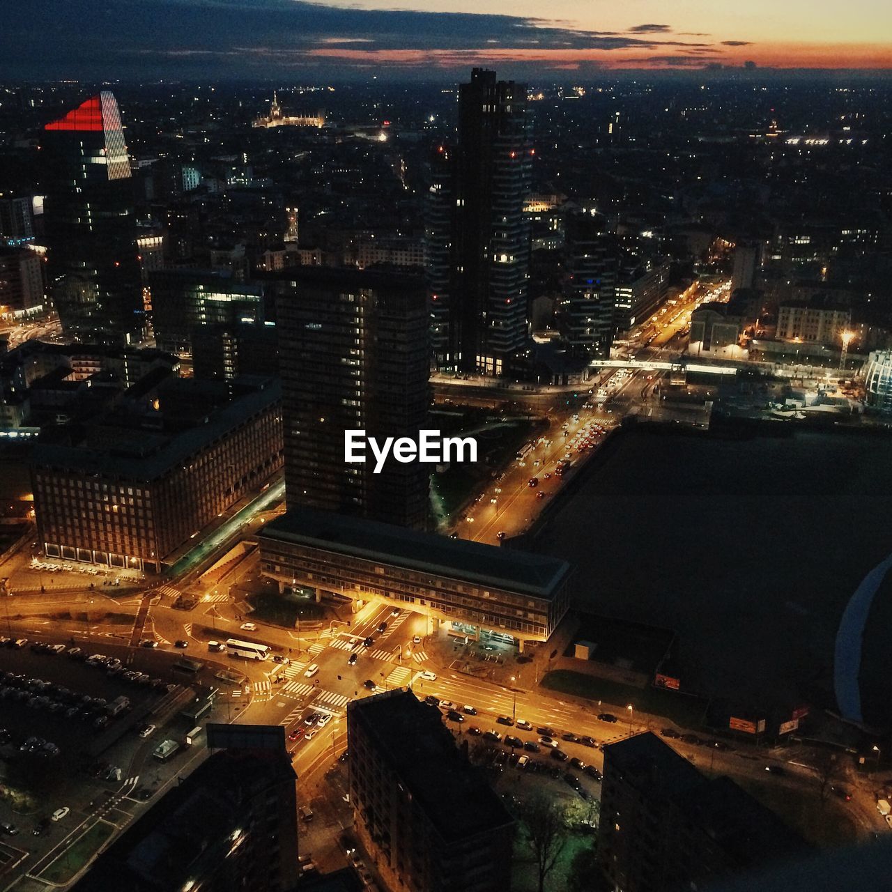 High angle view of illuminated cityscape at night