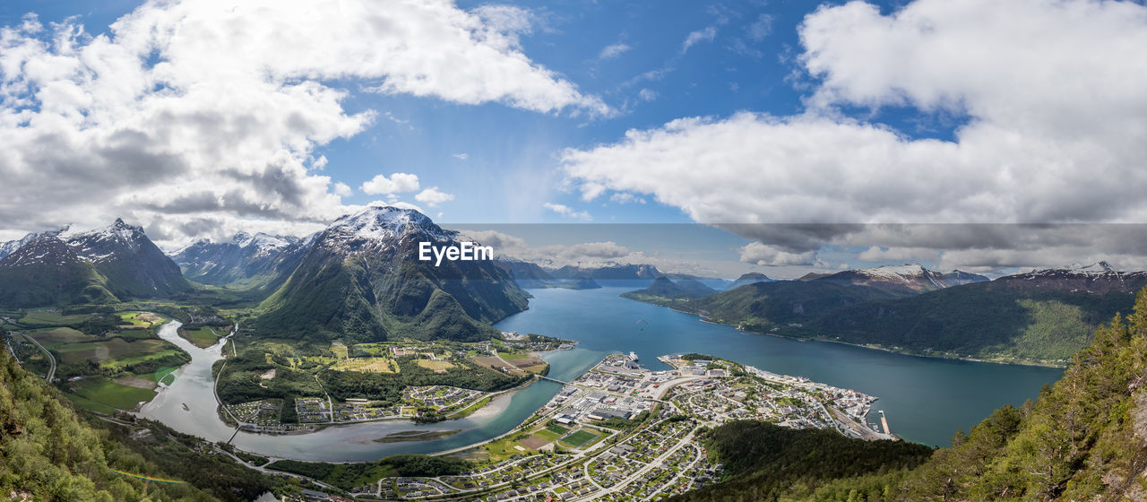 Panoramic view of lake and mountains against sky