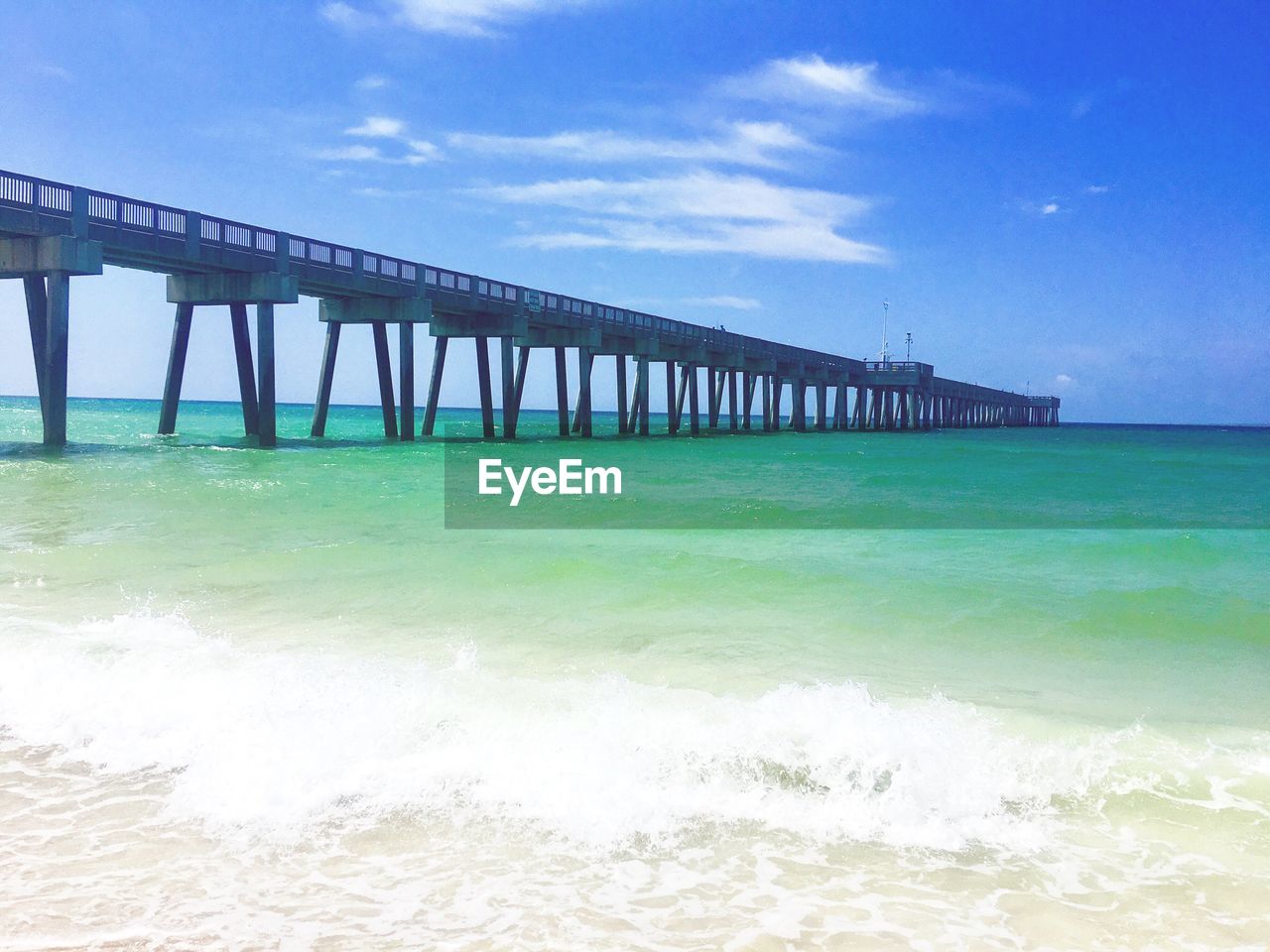 View of bridge over sea against sky