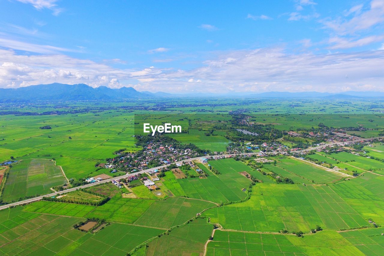 High angle view of landscape against blue sky