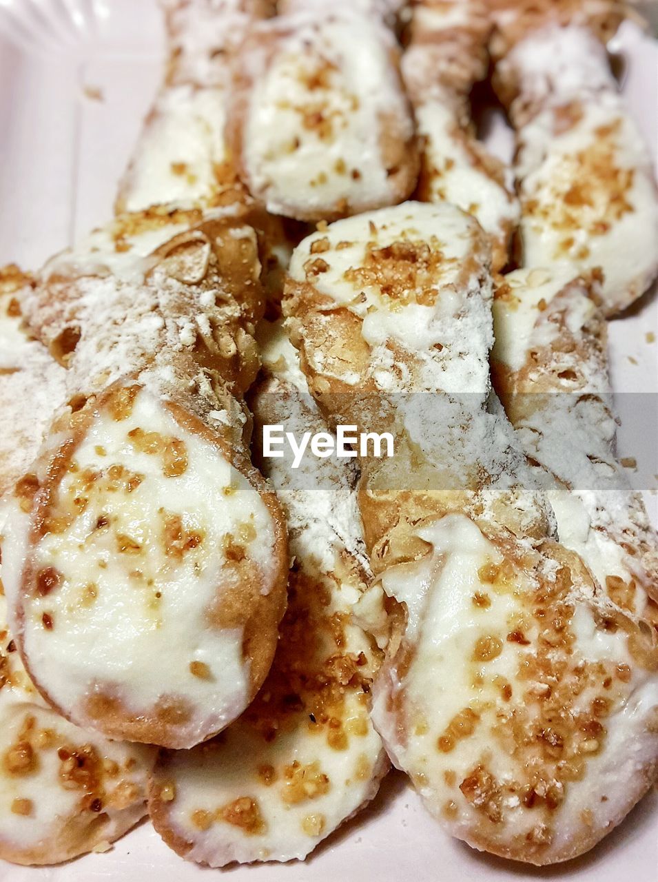 Close-up of cannoli in plate