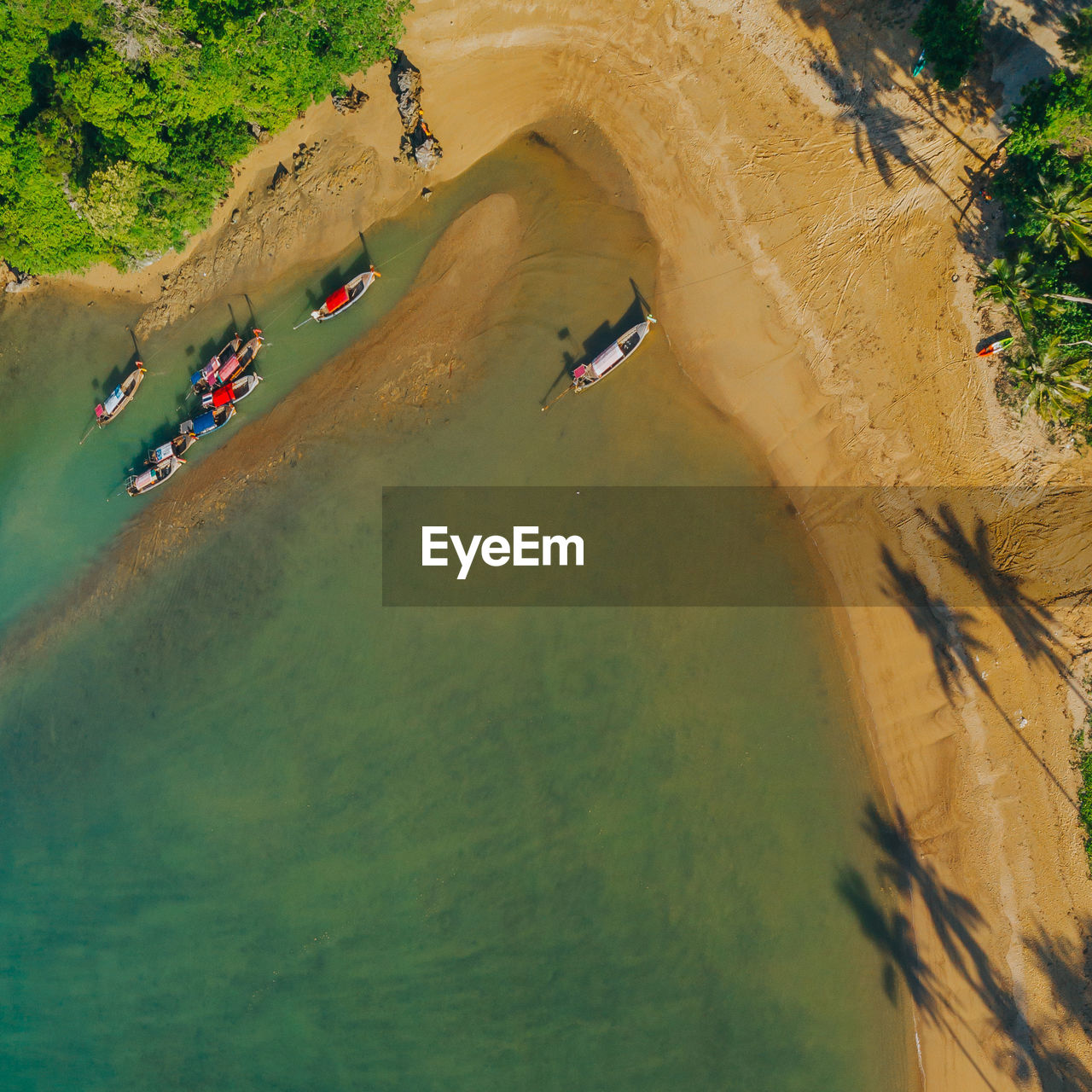 Aerial view of boat moored at beach