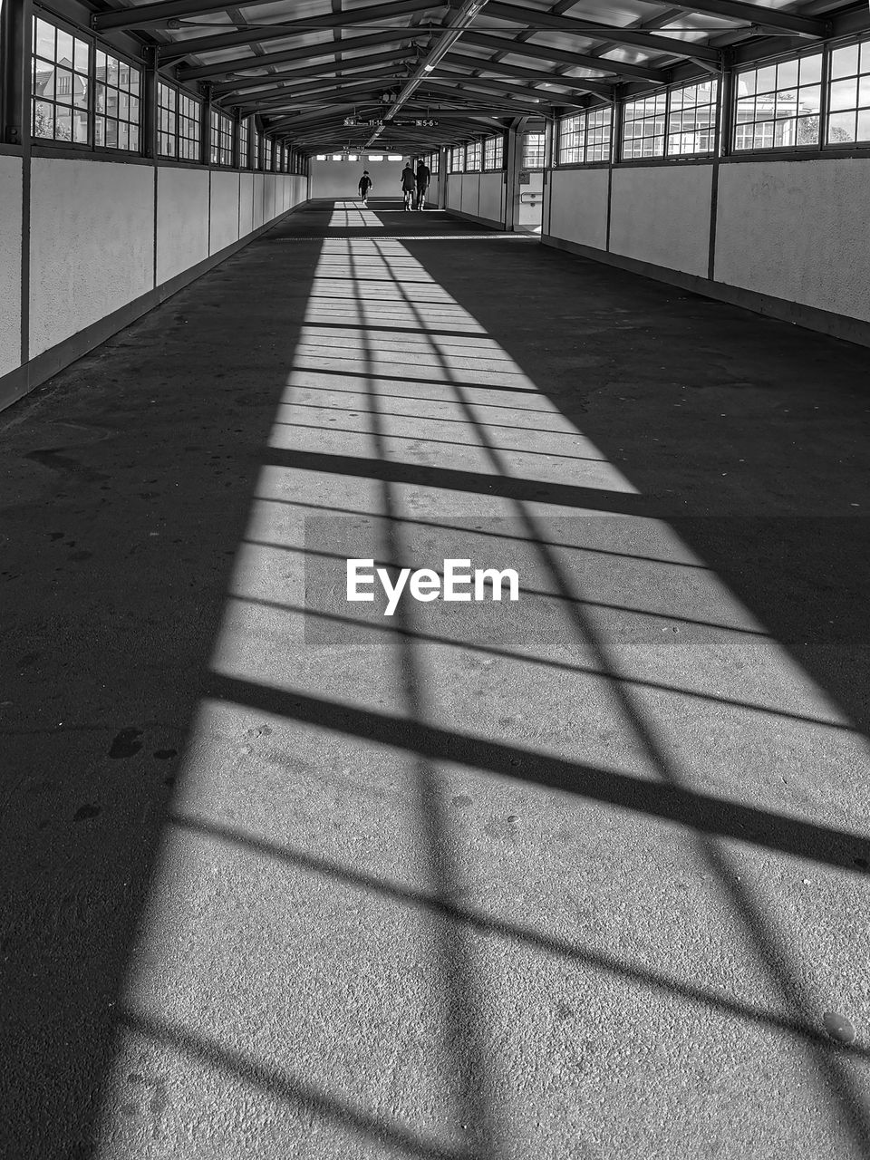 Shadow on footpath in building