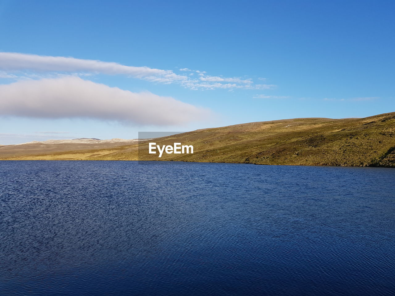 Scenic view of land against sky