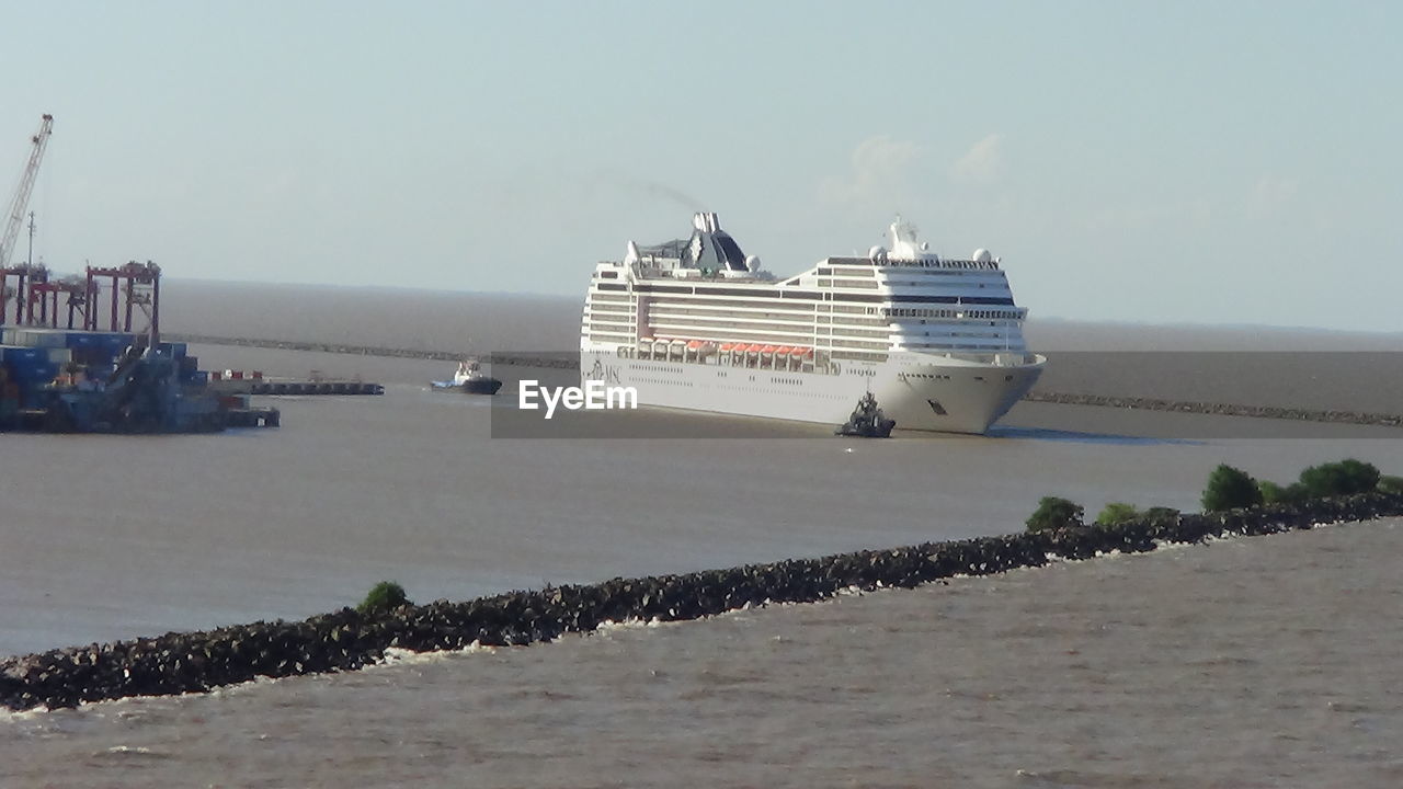 VIEW OF BOATS IN SEA