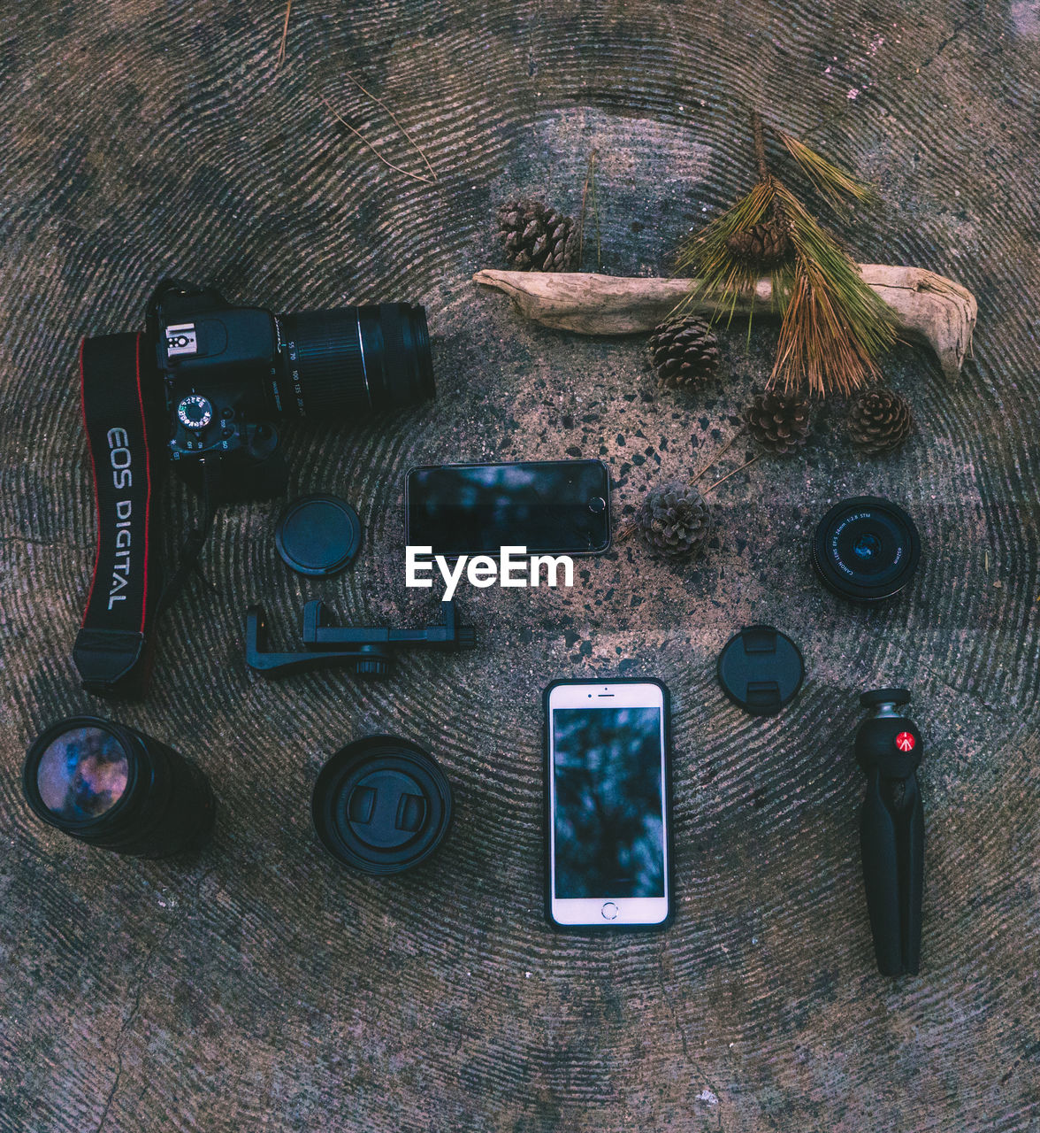 HIGH ANGLE VIEW OF CAMERA ON TABLE AT HOME