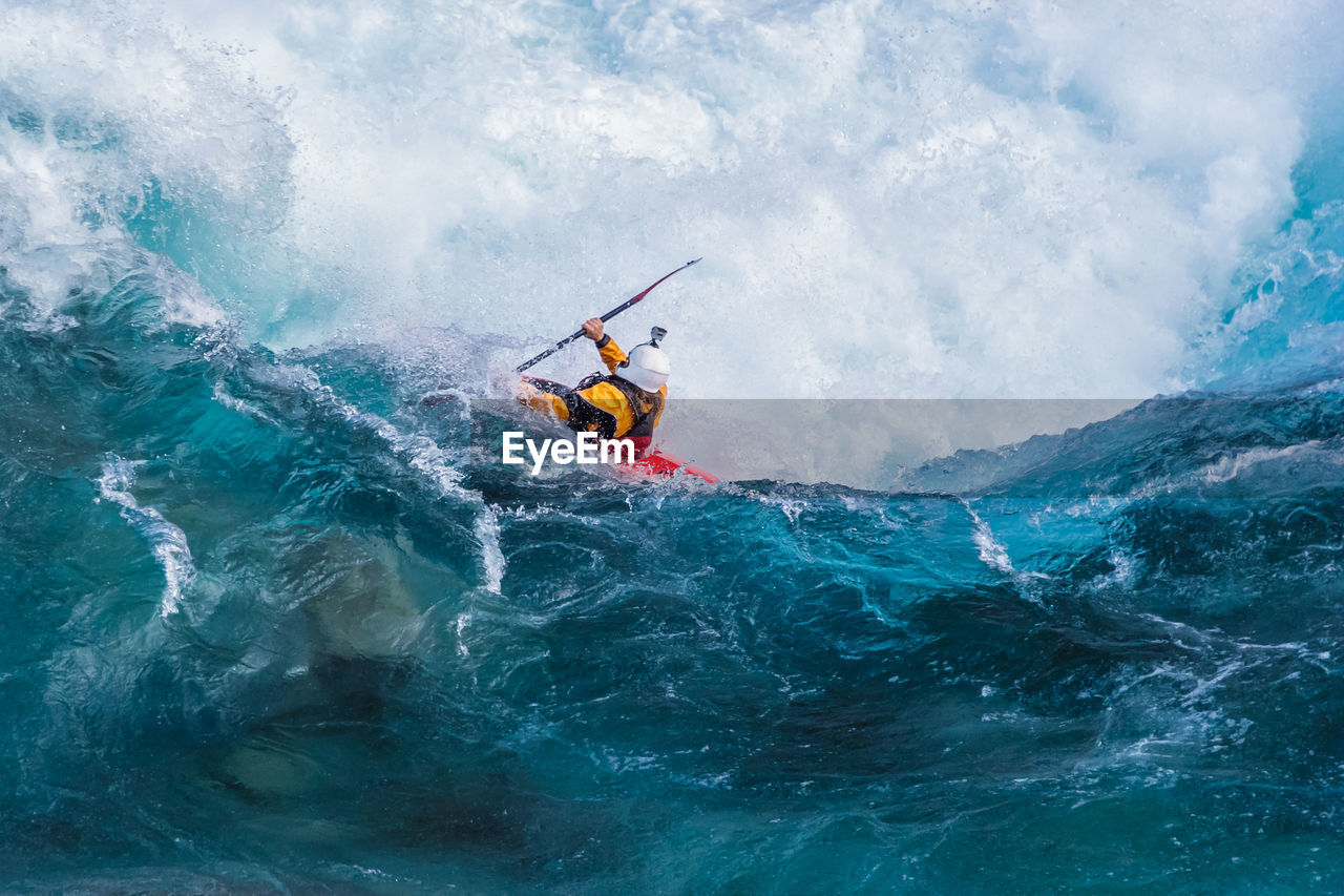 Kayaker descending the futaleufu river, a class 5 river in patagonia