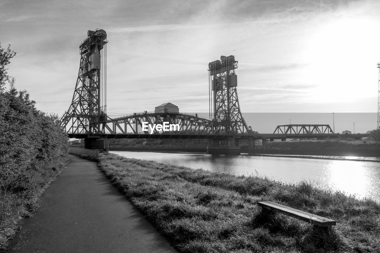 BRIDGE OVER RIVER AGAINST SKY