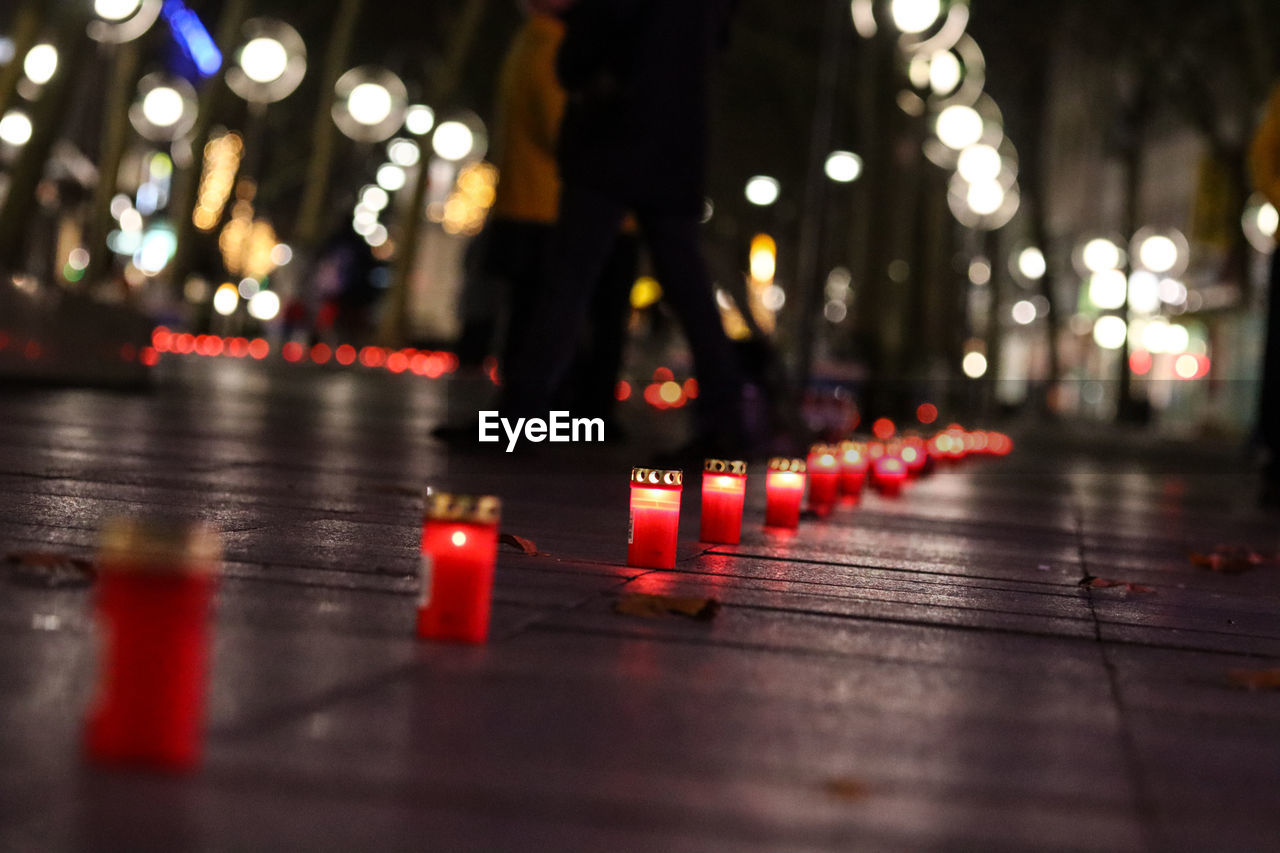 Illuminated lights on street at night