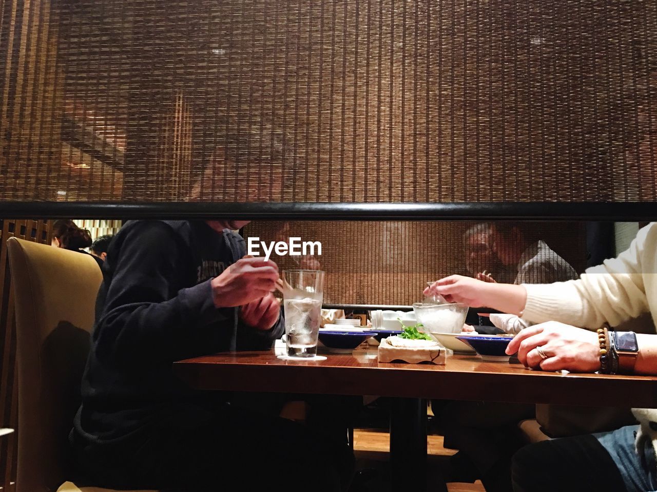 People eating at restaurant