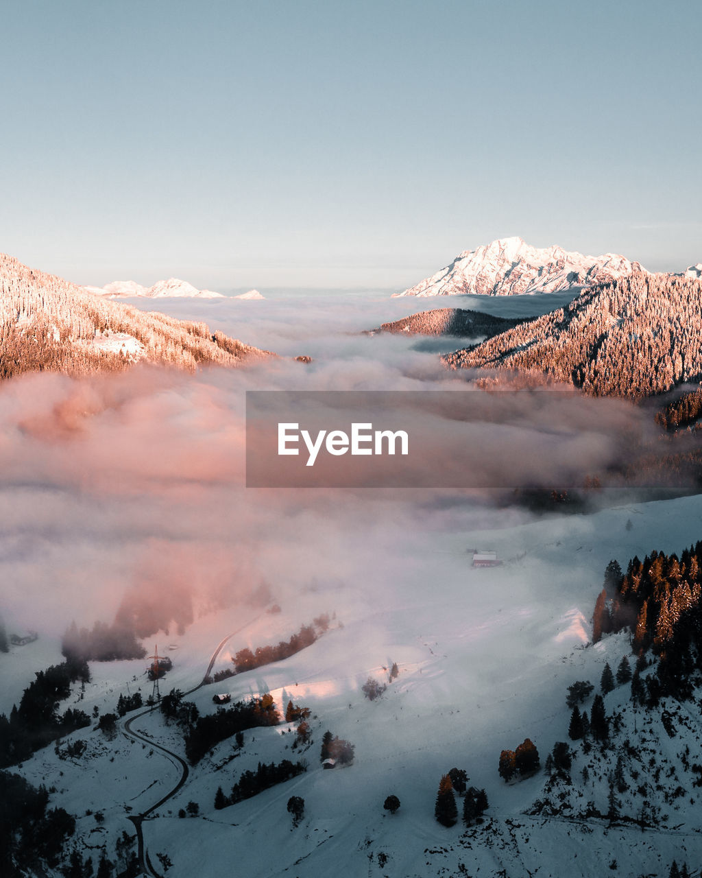 Scenic view of snow covered mountain against sky