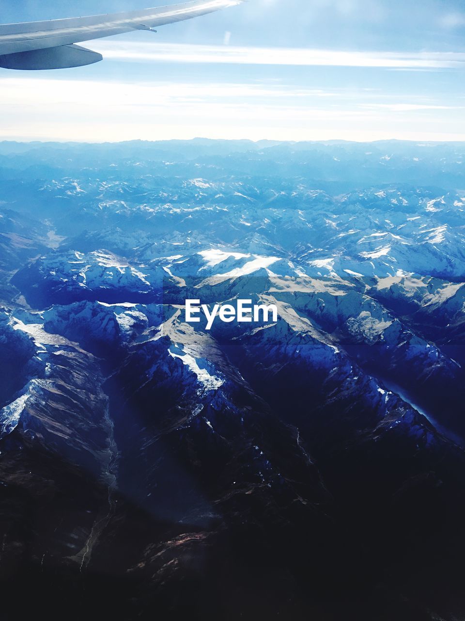 AERIAL VIEW OF LANDSCAPE WITH MOUNTAINS