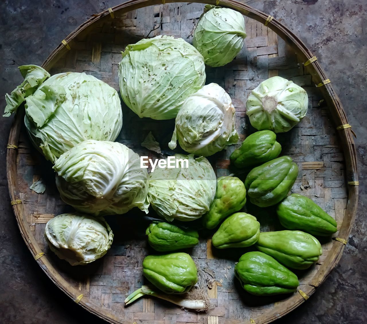 High angle view of vegetables in basket on table