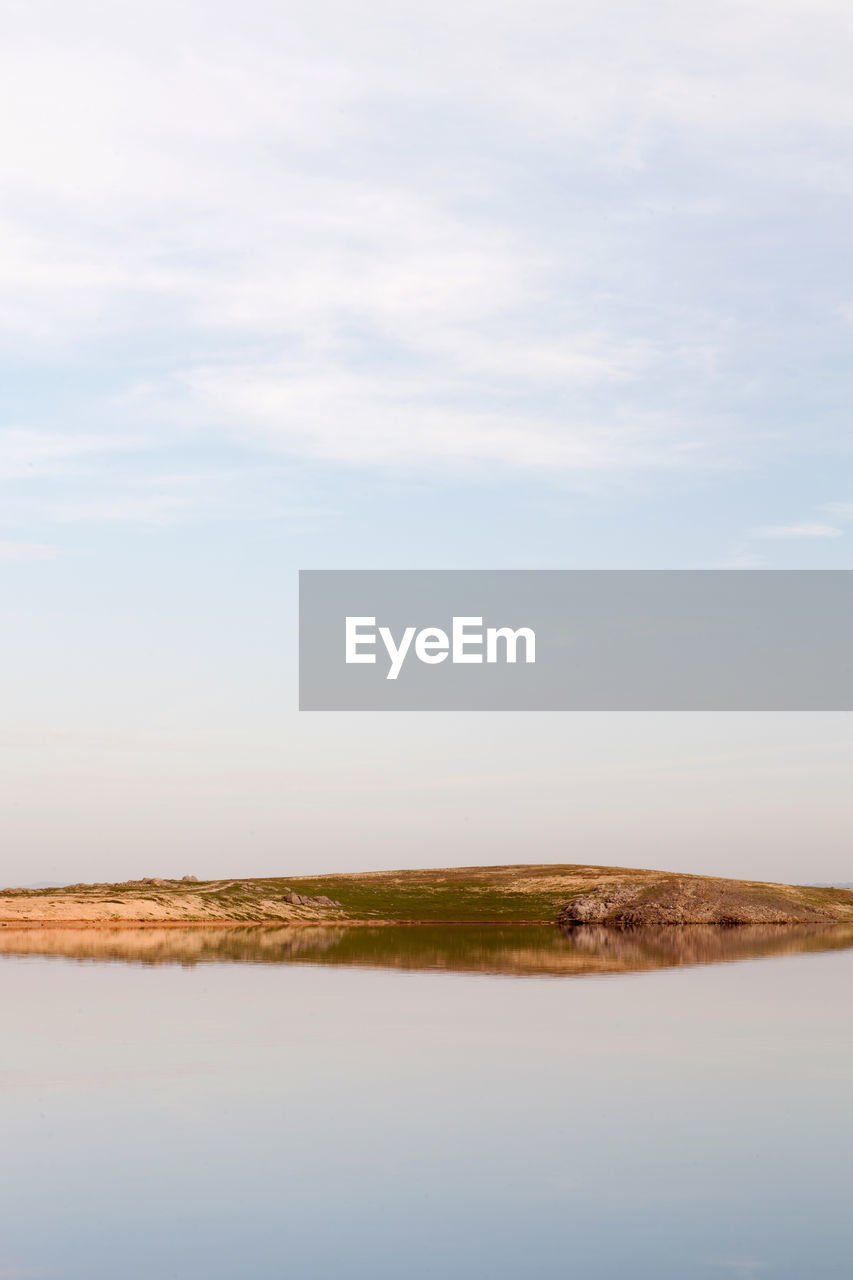 SCENIC VIEW OF LAKE AND LANDSCAPE AGAINST SKY