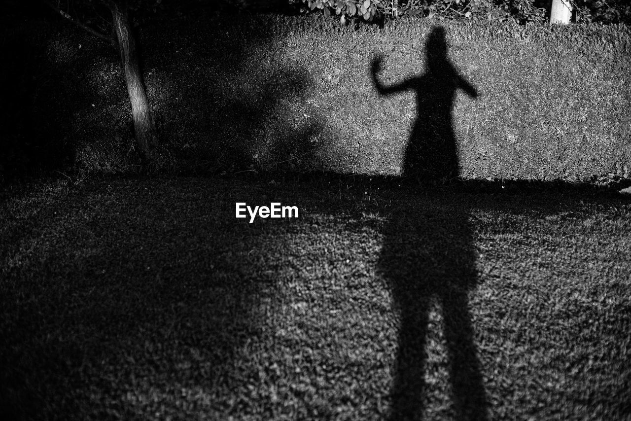 Shadow of person on cross