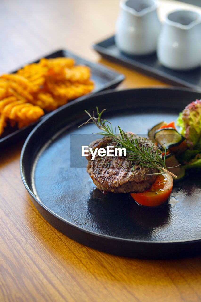 Close-up of food in plate on table