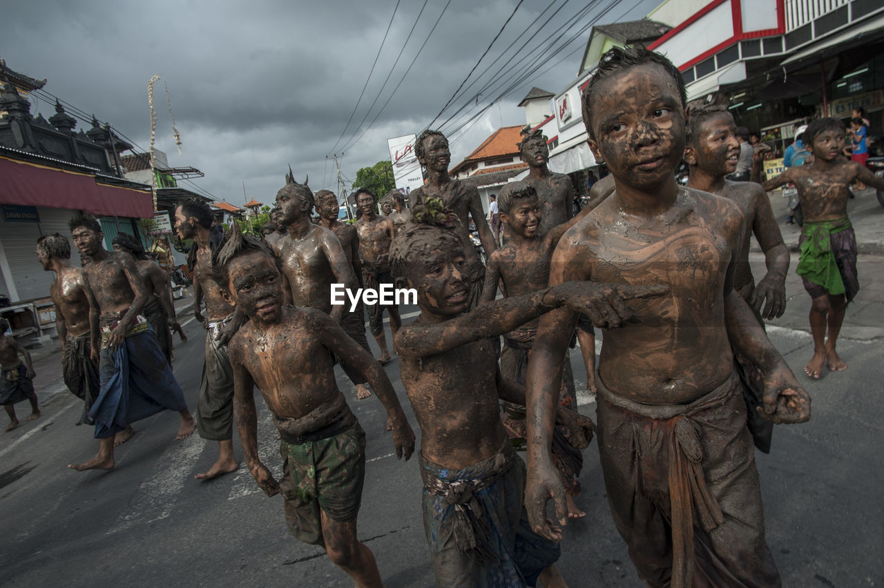 PANORAMIC VIEW OF PEOPLE ON STREET