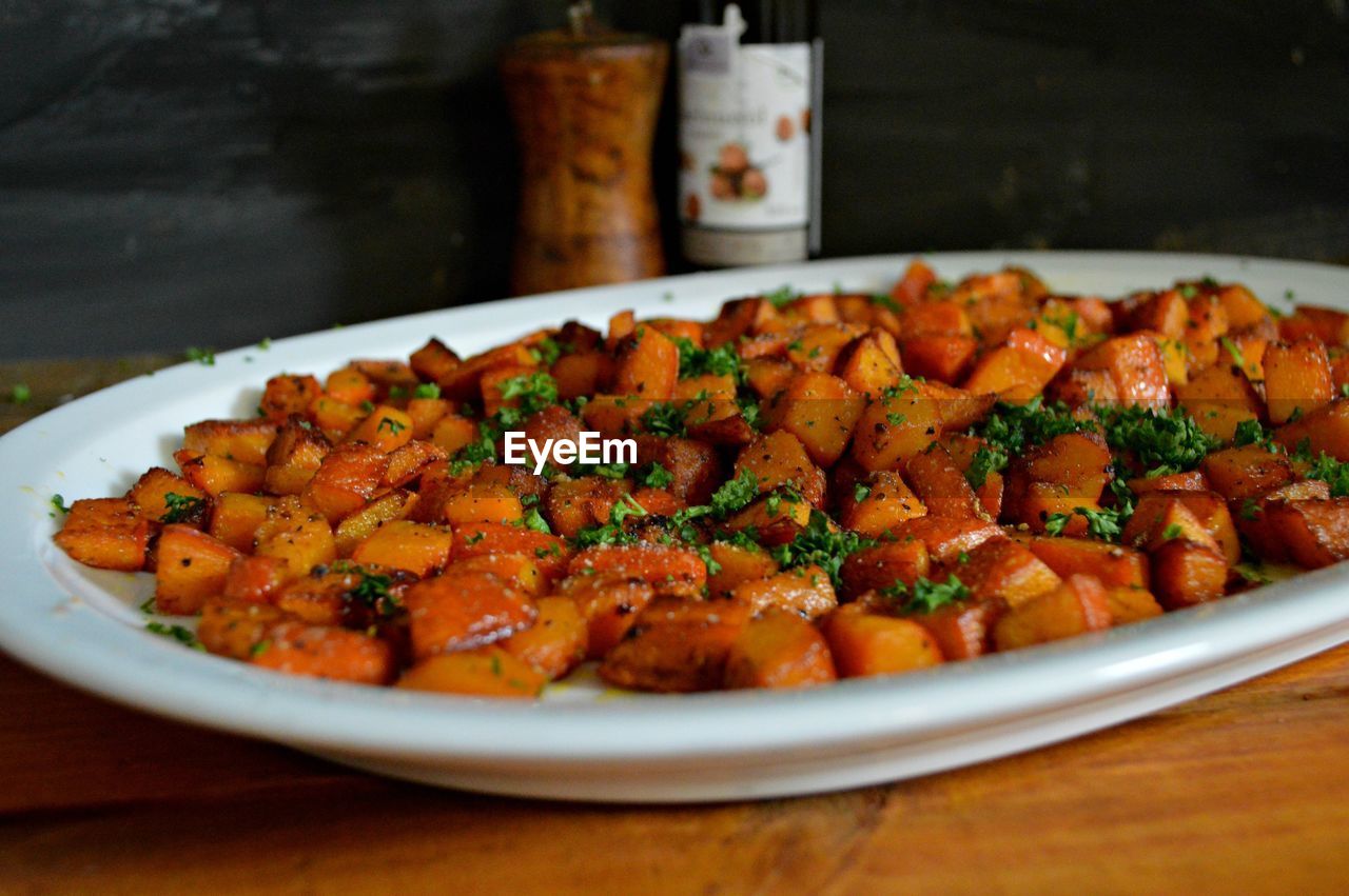 CLOSE-UP OF SERVED FOOD