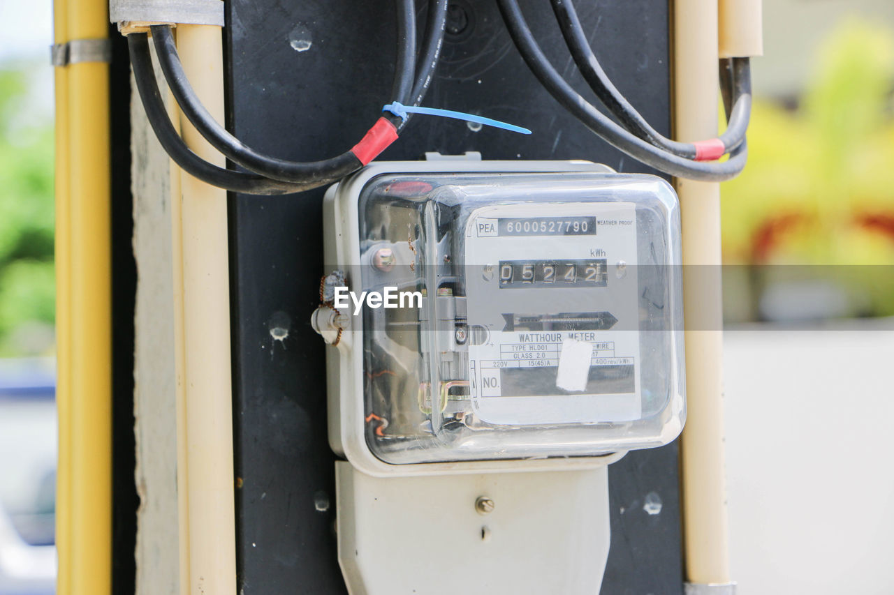 Close-up of electric meter outdoors