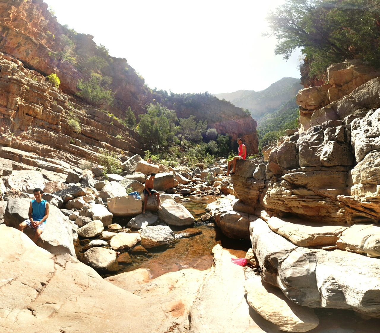 TOURISTS ON ROCK