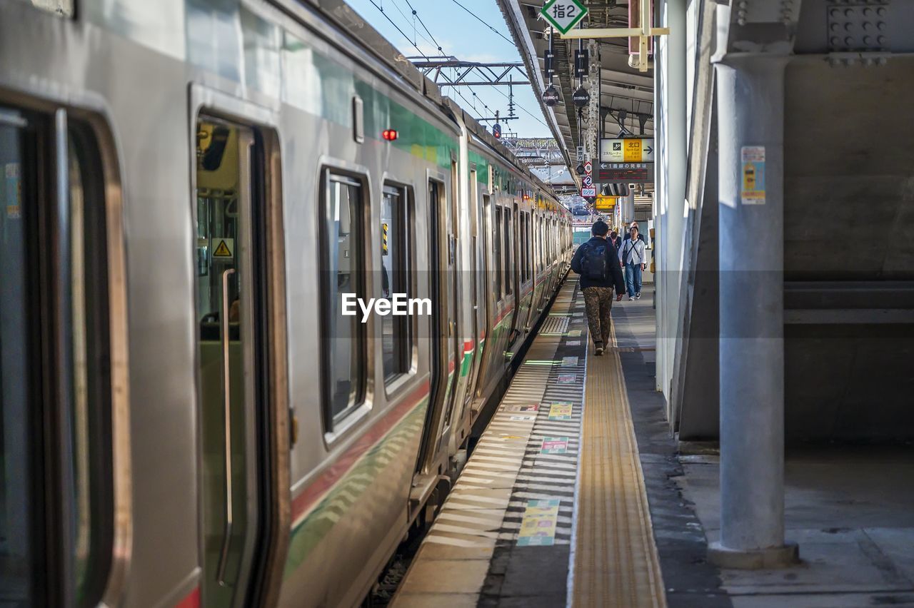 VIEW OF TRAIN AT RAILROAD STATION