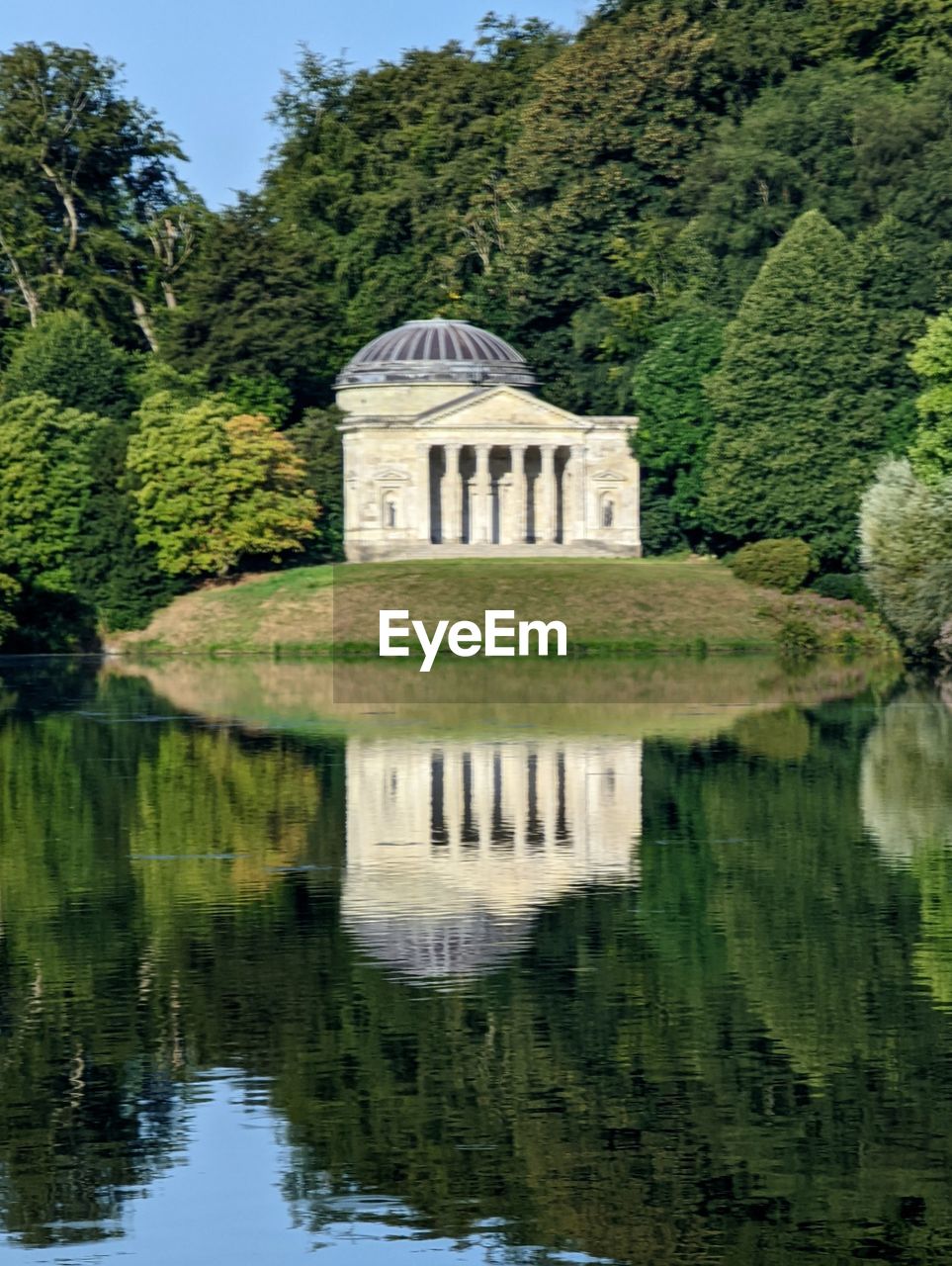 reflection, water, plant, tree, architecture, built structure, lake, building exterior, nature, château, no people, green, building, garden, history, travel destinations, the past, day, beauty in nature, reservoir, outdoors, tranquility, sky, flower, tourism, scenics - nature, moat, house, travel, rural area, formal garden