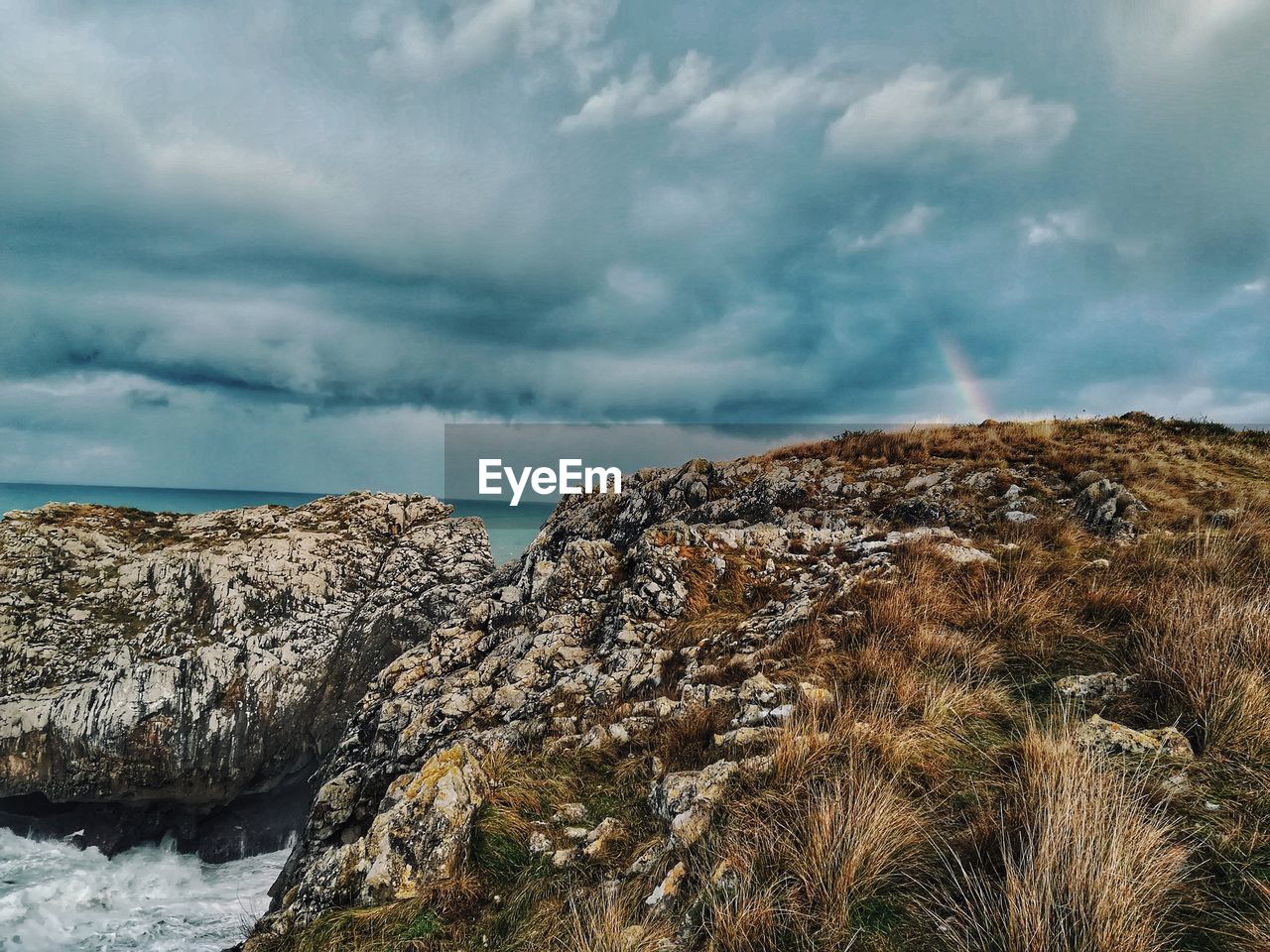 nature, sea, beauty in nature, cloud - sky, rock - object, tranquility, sky, scenics, tranquil scene, no people, outdoors, day, water, horizon over water