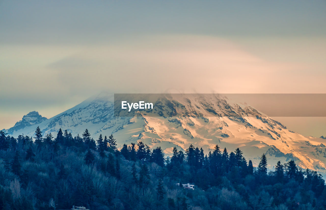 Clouds cover mount rainier across the puget soud in washington state.