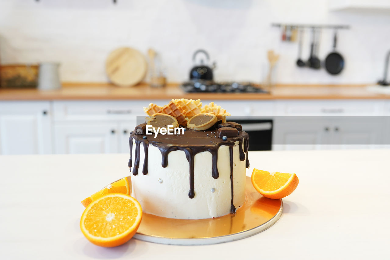 Lemon pie on a light background. citrus cake on kitchen table