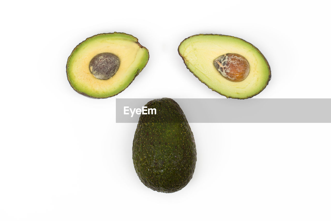 Close-up of sliced avocado against white background