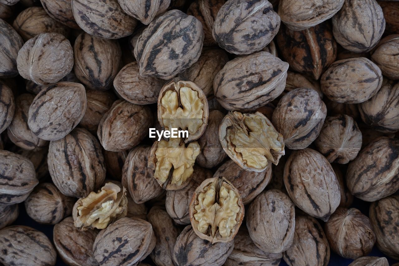 food and drink, food, large group of objects, full frame, wellbeing, healthy eating, freshness, backgrounds, produce, abundance, no people, still life, close-up, nut, plant, brown, nut - food, nuts & seeds, indoors, nutshell, walnut, directly above, high angle view, dried food