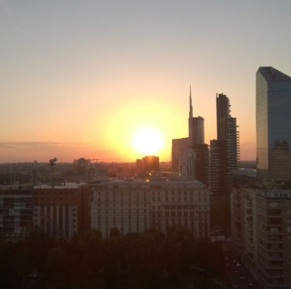 VIEW OF CITYSCAPE AT SUNSET