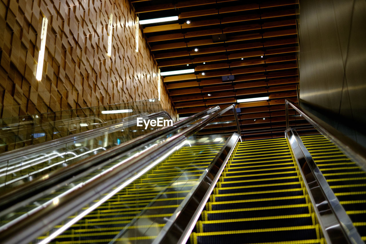 Low angle view of escalators