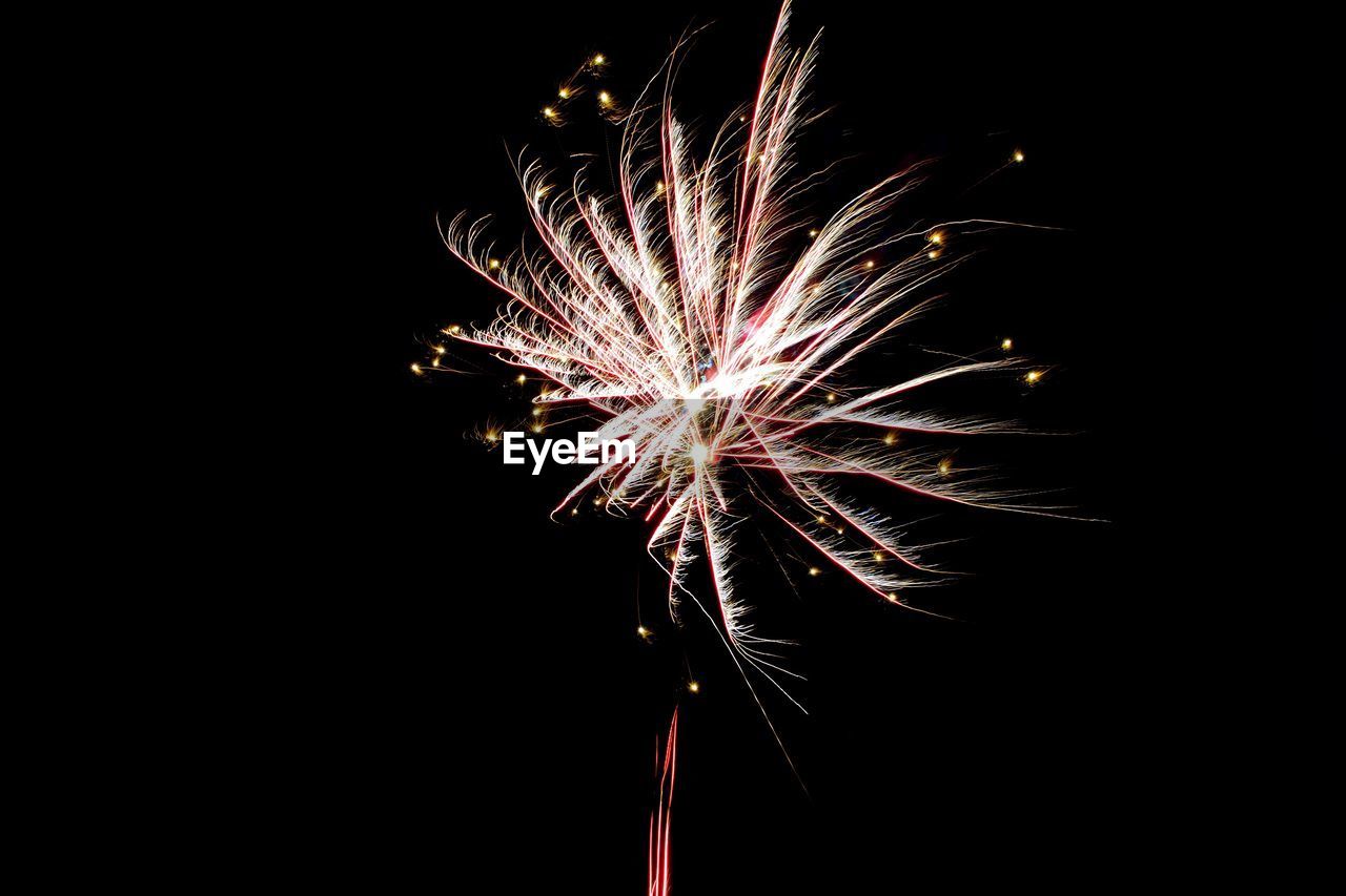 LOW ANGLE VIEW OF FIREWORK DISPLAY IN SKY