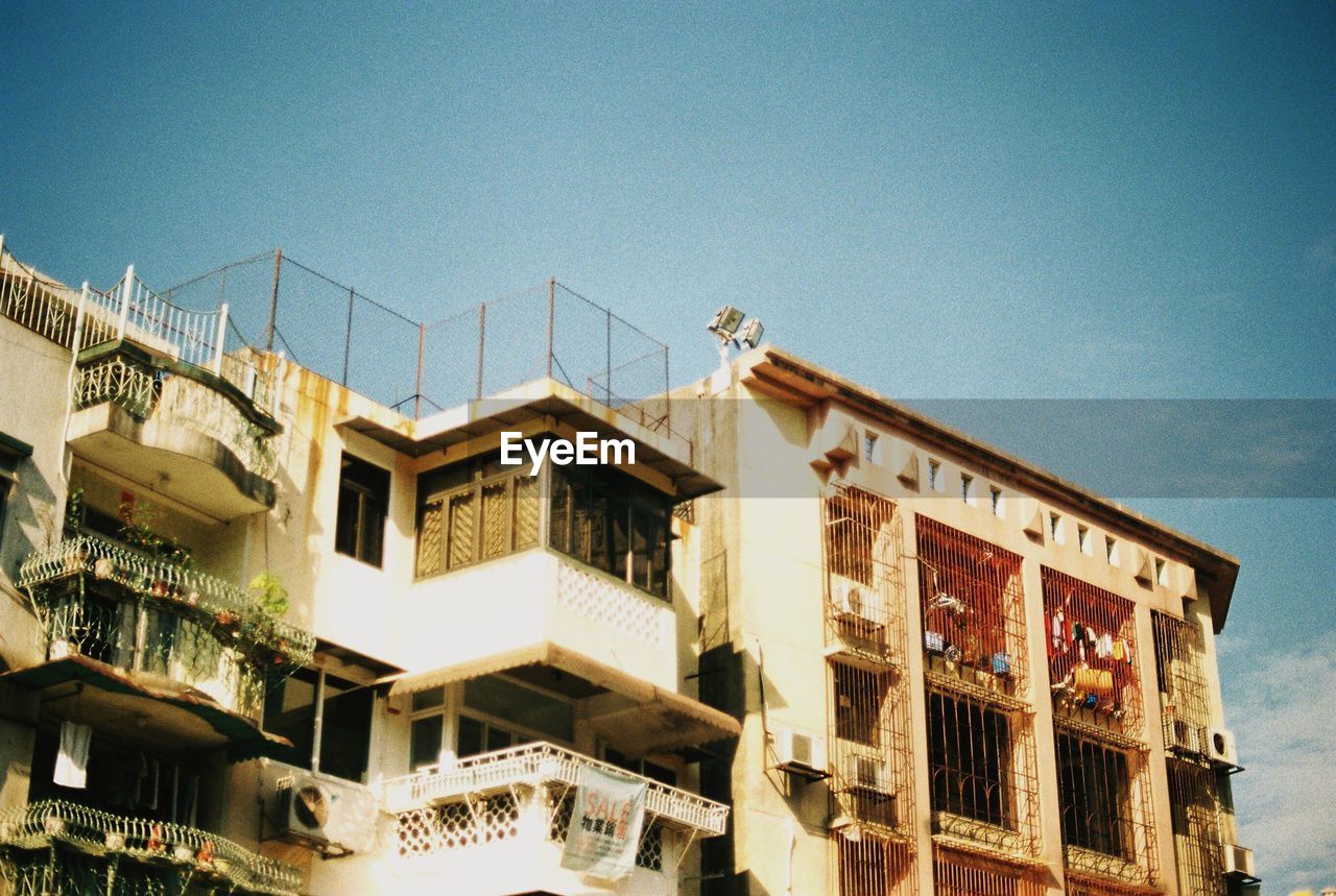 Low angle view of buildings against sky