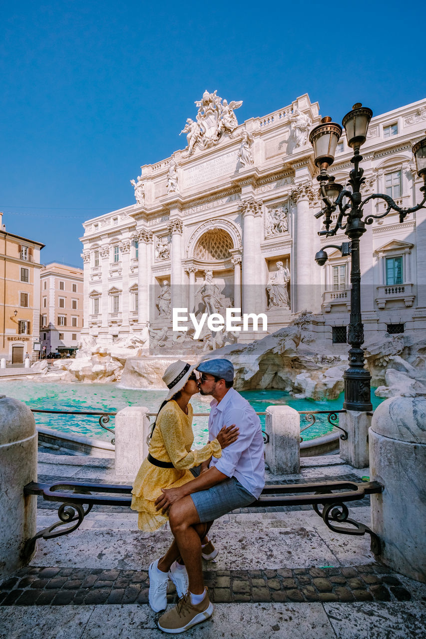 Couple against historical building