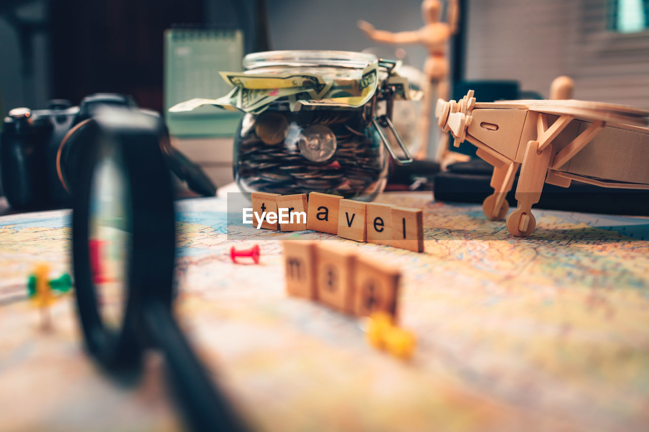 CLOSE-UP OF TOY ON TABLE