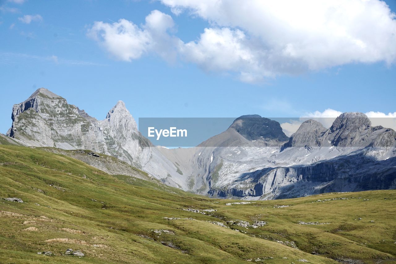 Scenic view of snowcapped mountains against sky