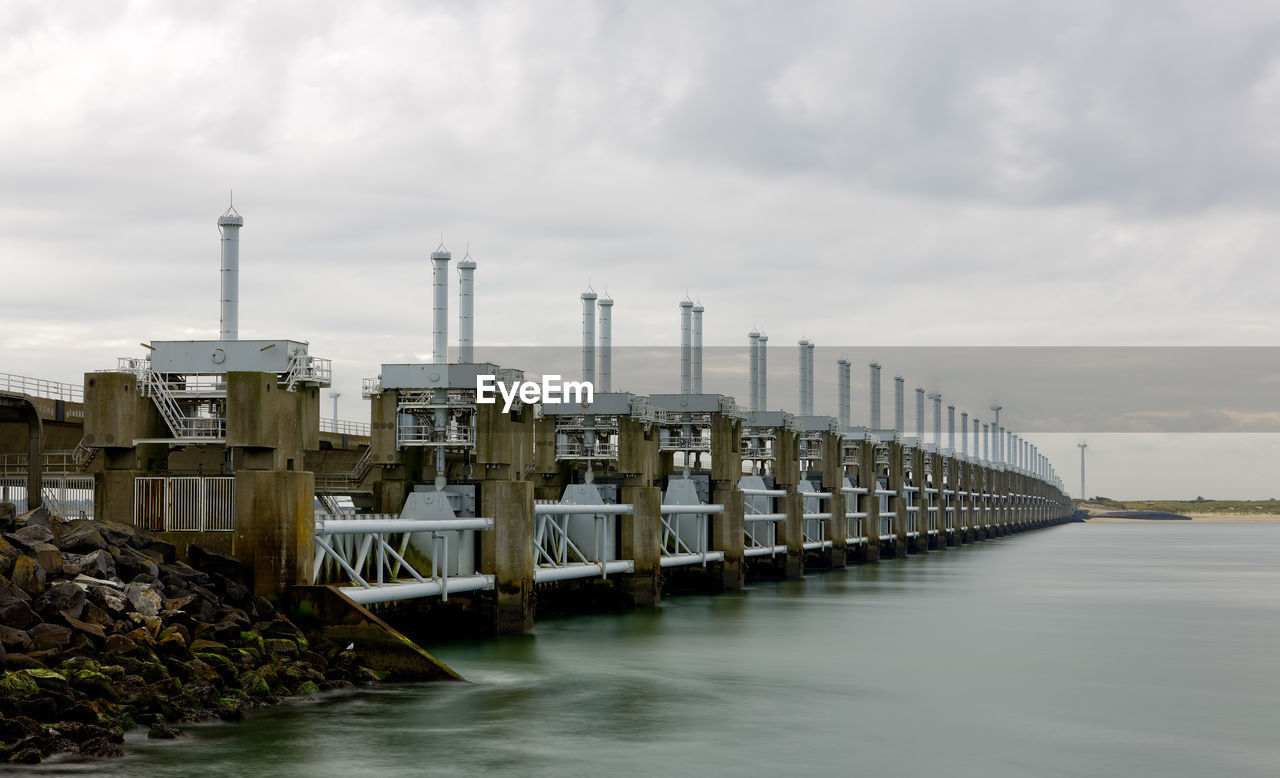 Pier over sea against sky