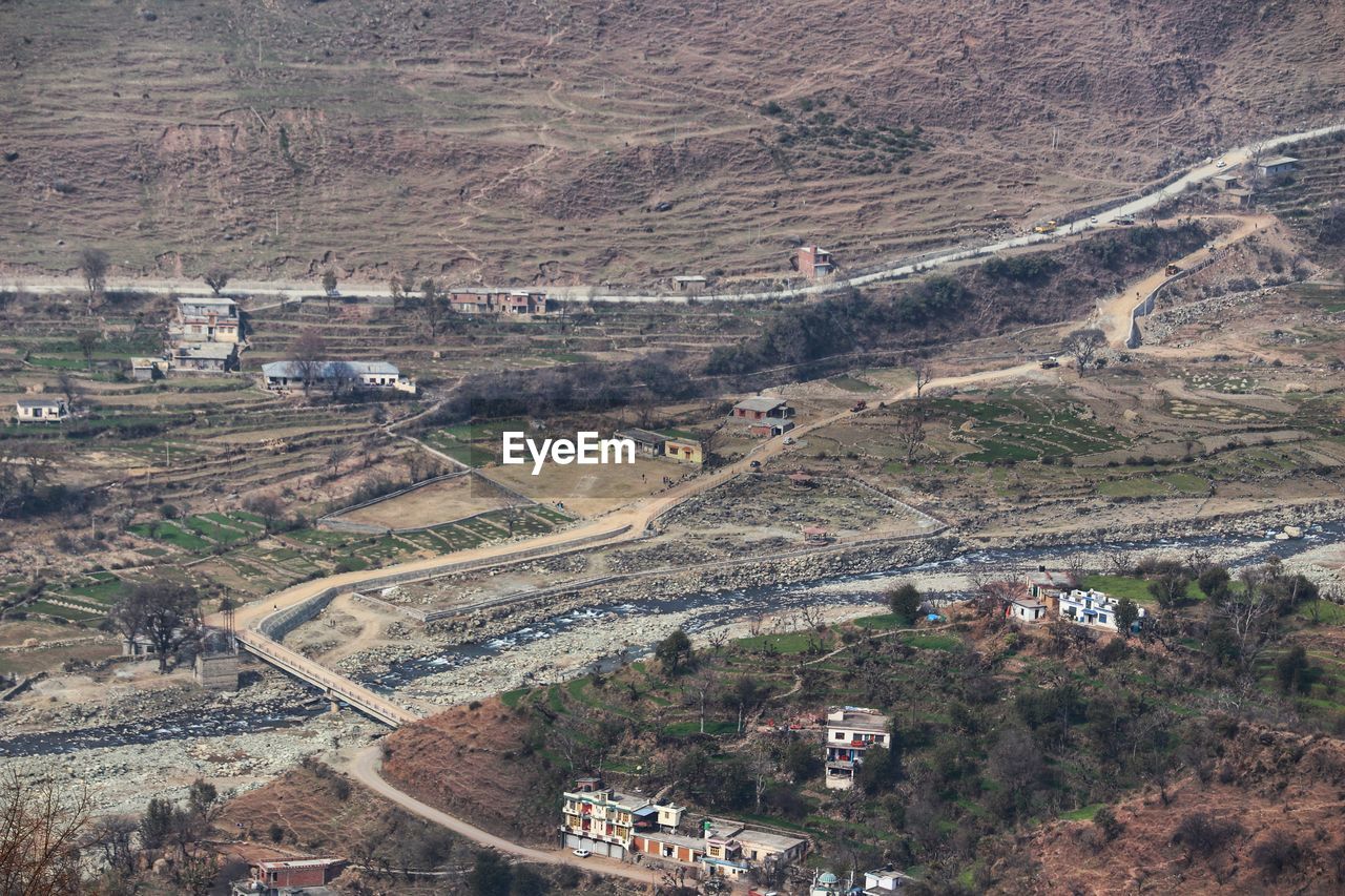 High angle view of road amidst buildings in city