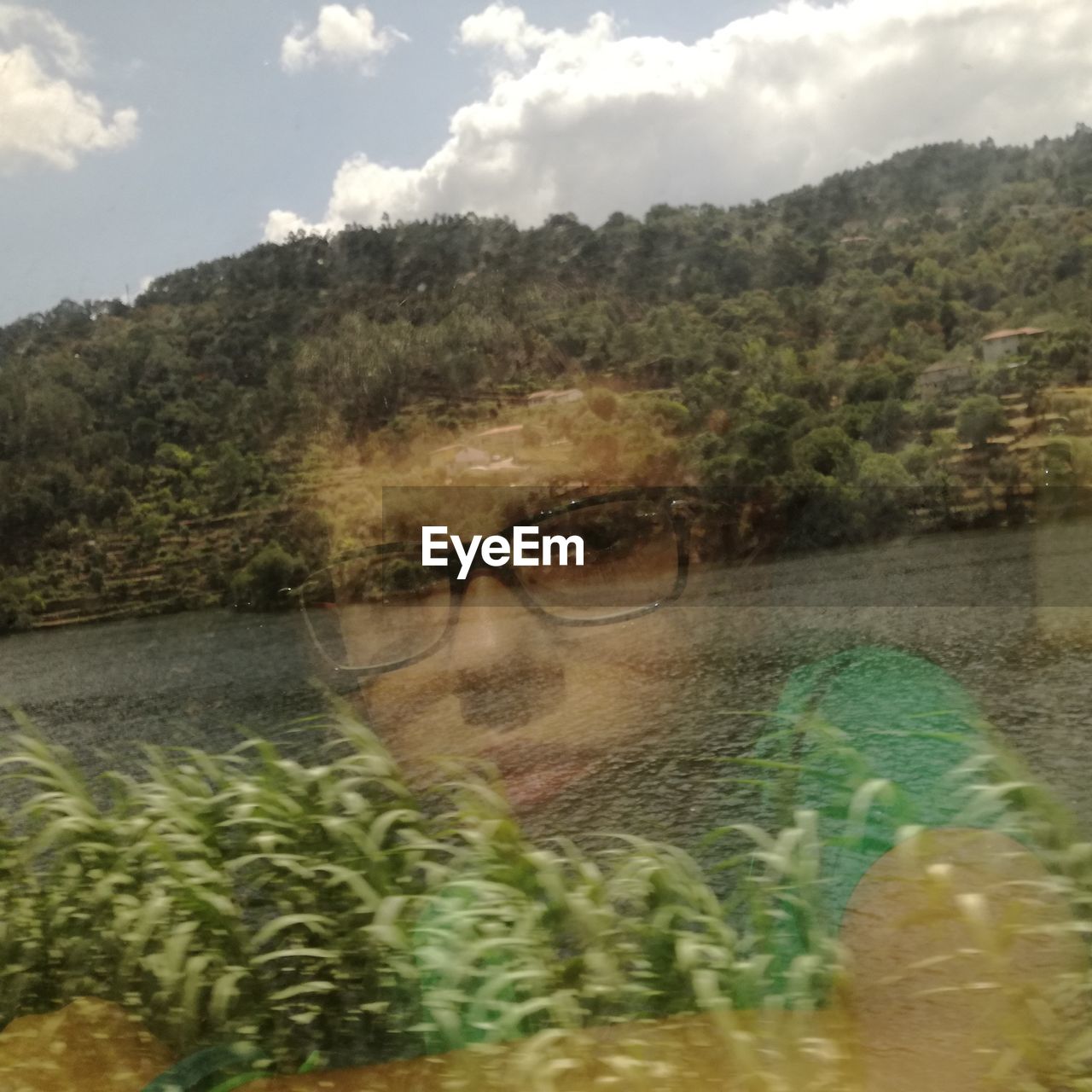 SCENIC VIEW OF RIVER BY TREE MOUNTAINS AGAINST SKY